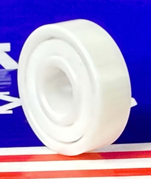 120-Pack Full Ceramic 608 ZrO2 Miniature Ball Bearings 8x22x7mm side view showing smooth white ceramic surface.
