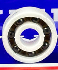 Full Ceramic ZrO2 608 Miniature Ball Bearing: Si3N4 Balls, Nylon Cage 8x22x7mm on a colorful background