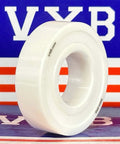 Side view of a 30-Pack Full Ceramic 6004-2rs ZrO2 Ball Bearing 20x42x12mm with VXB branding in the background.