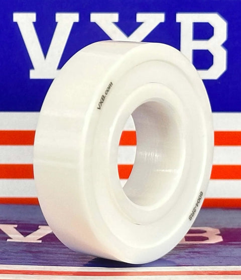 Side view of a 30-Pack Full Ceramic 6004-2rs ZrO2 Ball Bearing 20x42x12mm with VXB branding in the background.