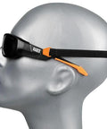 Side view of mannequin wearing full frame gasket safety glasses with foam seal, anti-fog and UV scratch-resistant, with nylon strap.