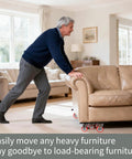 Person using 360 Degree Rotatable And Lockable Furniture Dolly With Five Wheels Rubber Silent Sliders under sofa in living room.