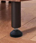Heavy Duty Furniture Glide Swivel Leveling Mounts 2 Inch Adjustable Feet under a table on wood floor