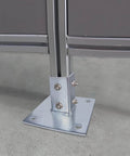 Two Pack Post Base Square Mount With Four Holes For One And Five Eighths Inch Single Strut Channel Galvanized Steel Heavy Duty Channel Support For Secure Installations shown installed on concrete surface.