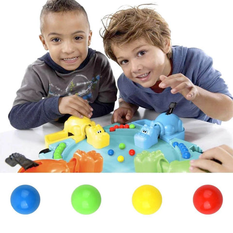 Children playing Hungry Hungry Hippos with 60Pcs Game Replacement Marbles Balls Compatible with Hungry Hungry Hippos in red, yellow, blue, green