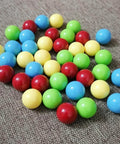 60Pcs Game Replacement Marbles Balls Compatible with Hungry Hungry Hippos in red, yellow, blue, green acrylic on fabric surface.