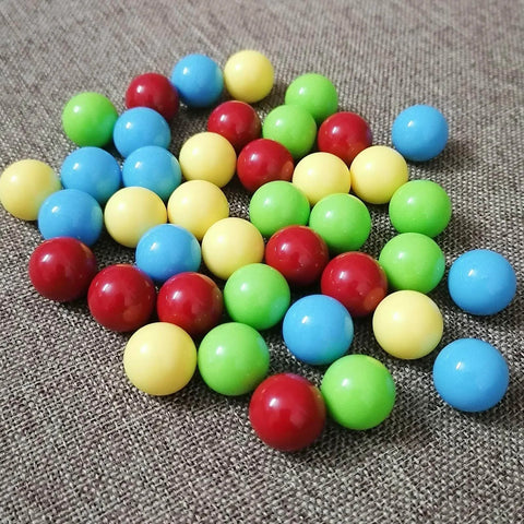 60Pcs Game Replacement Marbles Balls Compatible with Hungry Hungry Hippos in red, yellow, blue, green acrylic on fabric surface.