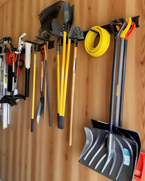 64 Inch Garage Wall Tool Organizer with Heavy Duty Rails and 10 Hooks, holding garden tools and shovels on wooden wall.