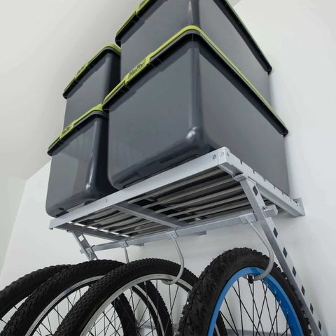 96 Inch Wide Wall Mounted Utility Storage Rack With 4 Bike Hooks And 20 Regular Hooks in use with bikes and storage bins in garage