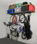 Garage Wall Shelf Two Pack In White Or Hammertone Finish Steel Wall Mounted Shelves With Bike Hooks Three Size Options Including 18x36 Inch Powder Coated Finish 500 Lb Weight Capacity For Overhead And Hanging Storage showing bikes and gear organized.