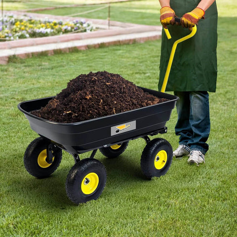 Heavy Duty Garden Dump Cart Utility Wagon with 600 LB Capacity 4 Cu Ft Bed shown hauling soil on grass