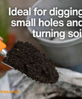 Heavy Duty Gardening Hand Trowel With Hang Hole For Digging And Planting Cast Aluminum Rust Resistant Head Ergonomic Handle And Comfort Grip Precision Tool For Tough Soil Weeding Transplants And General Yard Maintenance, close-up with soil.