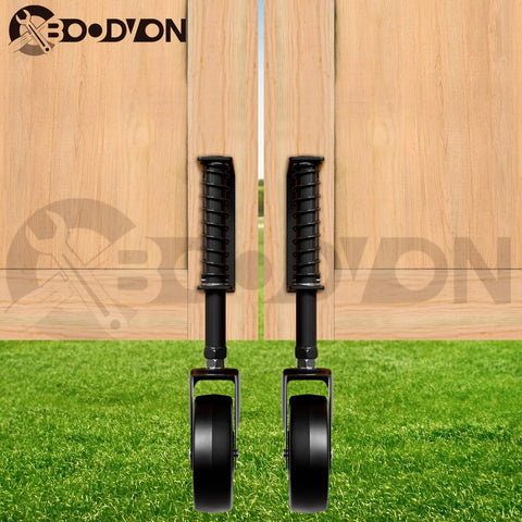 4 Inch Spring Loaded Swivel Gate Caster With Shock Absorbing Spring 360 Degree Rolling 220 Lb Capacity Black Finish attached to wooden gate
