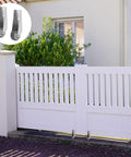 Gate Caster Wheels Replacement Set With Sinking Door Bottom Pulley on white garden gate, showing rubber swivel casters in use.