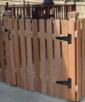 Wooden gate with Beefy Gate Hardware Kit with self locking gate latch and two 6 inch T hinges, black powder coated steel, outdoor installation