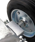 Close-up of a rolling gate wheel carrier with 6 inch rubber wheel and galvanized steel bracket for chain link fences and sliding gates.