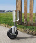 Gate Wheels With Side Brake For Farm Yard Gates And Barn Doors Spring Loaded Gate Casters With 220 Lbs Load Capacity Zinc Plated Steel Brackets And Durable TPR Wheels Locking Side Brake For Secure Position And Smooth Outdoor Use installed on wooden gate