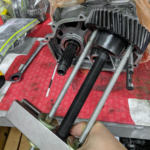 Beefy Heavy Duty Gear And Pulley Puller With 2 Inch To 7 3 Quarters Inch Spread, 8 1/4 Inch Wide Block in use on machine