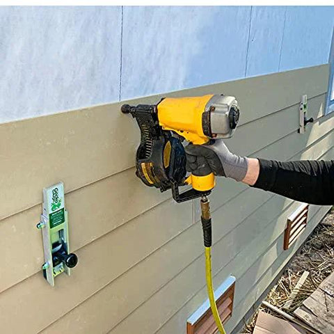 Installing fiber cement siding with Aluminum Gecko Gauge offers precise height and spacing, showing mounted tool holding boards steady.