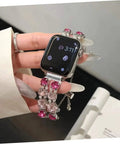 Apple Watch with pink crystal band on hand, using 10 Pack Watch Strap Connecting Adapters For Smartwatch Alloy Durable Silver Connection Compatible With Apple Watch Bands Effortless Installation Easy To Attach And Detach For Seamless Band Swaps And Wide Style Options