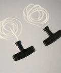 Two pieces from the Three Piece Universal Generator Starter Handle Pull Rope Set without cover, featuring durable plastic handles and white polyester ropes.