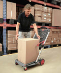Man using Original German Made Collapsible Cart With Storage Crate Multiuse Folding Trolley for Shopping Hotels Catering Warehouse