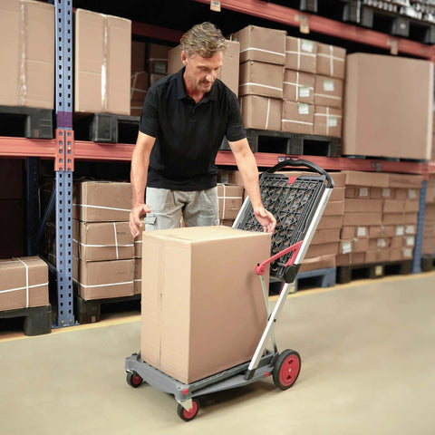 Man using Original German Made Collapsible Cart With Storage Crate Multiuse Folding Trolley for Shopping Hotels Catering Warehouse