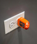 GFCI receptacle tester plugged into wall socket from Infrared Thermometer and GFCI Receptacle Tester Kit