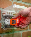 Infrared Thermometer and GFCI Receptacle Tester Kit in use testing electrical outlet safety