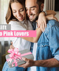 Couple holding a wrapped 25 Piece Pink Tool Set for Women Portable DIY Home Repair Kit with Beginner Friendly Tools, pink ribbon.