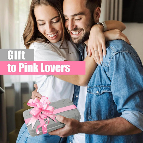 Couple holding a wrapped 25 Piece Pink Tool Set for Women Portable DIY Home Repair Kit with Beginner Friendly Tools, pink ribbon.