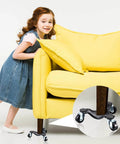 4pcs Furniture Moving Dolly Set with 3 Wheel Steel Tri Dollies under a yellow couch, highlighting triangle swivel casters.