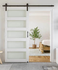 36 x 84 in Glass Barn Door with 6.6FT Sliding Hardware Kit & Handle, Pre-Drilled Ready to Assemble, showing in modern interior