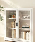 White cabinet with glass doors and 10 Pack 3 Inch 76mm Black Cabinet Pulls Heavy Duty Zinc Alloy Handles For Kitchen Cabinets Dressers Drawers Closets And Wardrobes Vintage Style Hardware For Cabinets Vanities And Furniture, displaying books and decor.