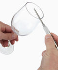 Compact blue handle glass repair file with carbide steel and diamond grit; retractable 5.42 inch design smoothing a wine glass edge