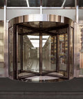 Stainless steel revolving glass door at entrance of modern building