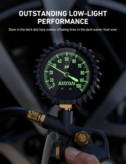 Tire Pressure Gauge With Inflator 0-100 PSI ANSI B40.1 Accuracy Large 2.5 Inch Glow Dial in use, showing glowing gauge needles and numbers close-up.