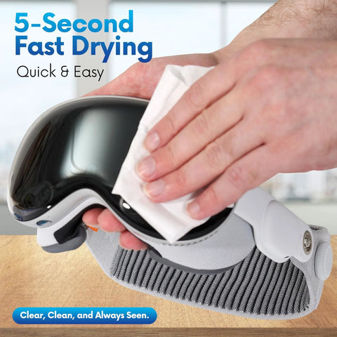 Front view of hand cleaning a reflective helmet visor with a pre-moistened eyeglass lens wipe