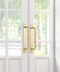 2 Pack Gold 7 Inch Barn Door Handles For Sliding Closet Doors With Backplates And Drawer Pulls installed on white doors