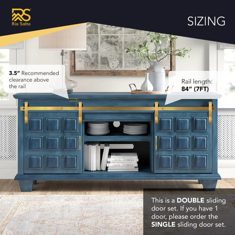 Gold Mini Barn Door Hardware Kit 7Ft Track With Handles For Double Doors And Cabinets installed on blue media console