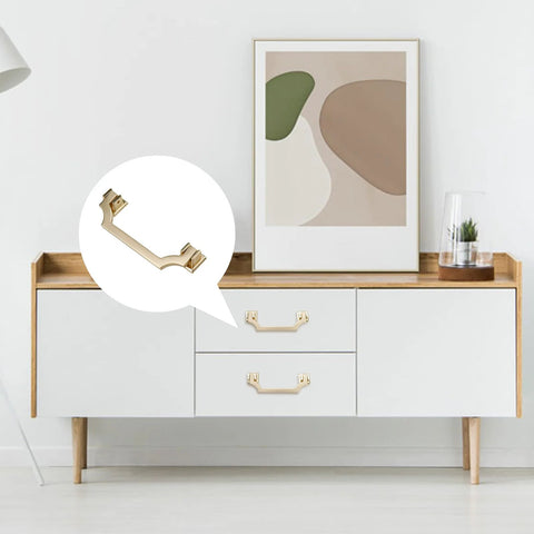Gold Brushed Cabinet Handles Pulls Set Of 4 Zinc Alloy Drawer Knobs installed on modern white cabinet in living room.