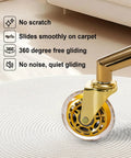 Close-up of gold tone caster wheel from Metal Base Replacement Set For Office And Gaming Chairs on carpet, details included.