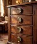 Gold Finish Cast Iron Crescent Moon Cabinet Knobs Set Of 6 installed on vintage wooden dresser drawers.