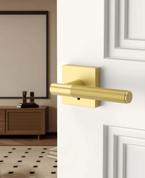 Gold Privacy Door Handle Set 1 Pack With Interior Keyless Lever And Knobs For Bedroom Or Bathroom, mounted on a white door indoors.