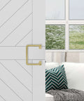 National Hardware N700-105 Interior Sliding Barn Door Troy Pull 8 Inch Brushed Gold Finish installed on wood interior door