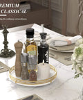 White marble lazy susan turntable for table top, 10 inch round natural marble tray with gold frame displaying condiments.