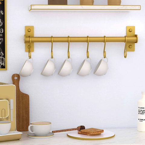 Kitchen Utensil Holder Hanger, Pot and Pan Rack Wall Mounted, gold, with 8 hooks holding mugs, mounted on kitchen wall.