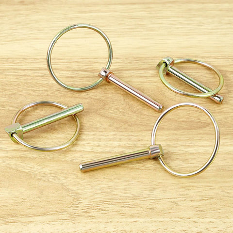 4 Pack Heavy Duty Stainless Steel Gold Lynch Pins With Ring For Trucks Tractors Trolleys Lawn Mowers And Trailers One Quarter Inch By One And Three Quarter Inch Zinc Coated Six Millimeter By Forty Five Millimeter Corrosion Resistant on wood surface