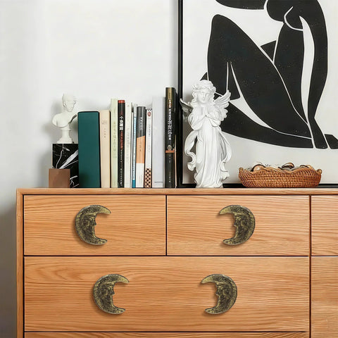 Gold Finish Cast Iron Crescent Moon Cabinet Knobs Set Of 6 for Vintage Gothic Furniture on wooden dresser