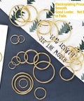 Gold Metal O Rings Set 60 Pcs In 6 Sizes Multi Purpose Buckle Loop Rings For Hardware Bags DIY Keychains Belts Craft Projects 15mm 20mm 25mm 32mm 38mm 50mm displayed on fabric surface